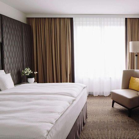 Hotel Pullman Berlin Schweizerhof Esterno foto A room at the Hotel de France