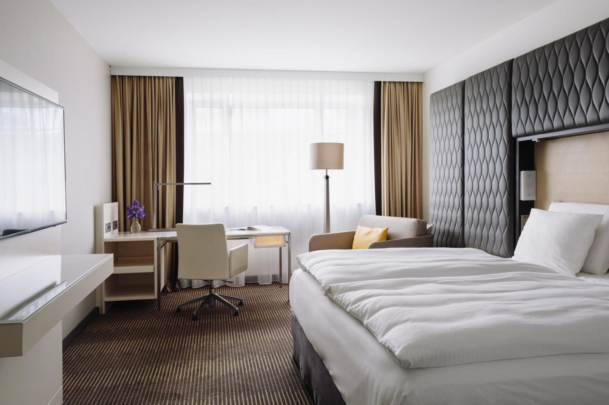 Hotel Pullman Berlin Schweizerhof Camera foto A room at the InterContinental Wien