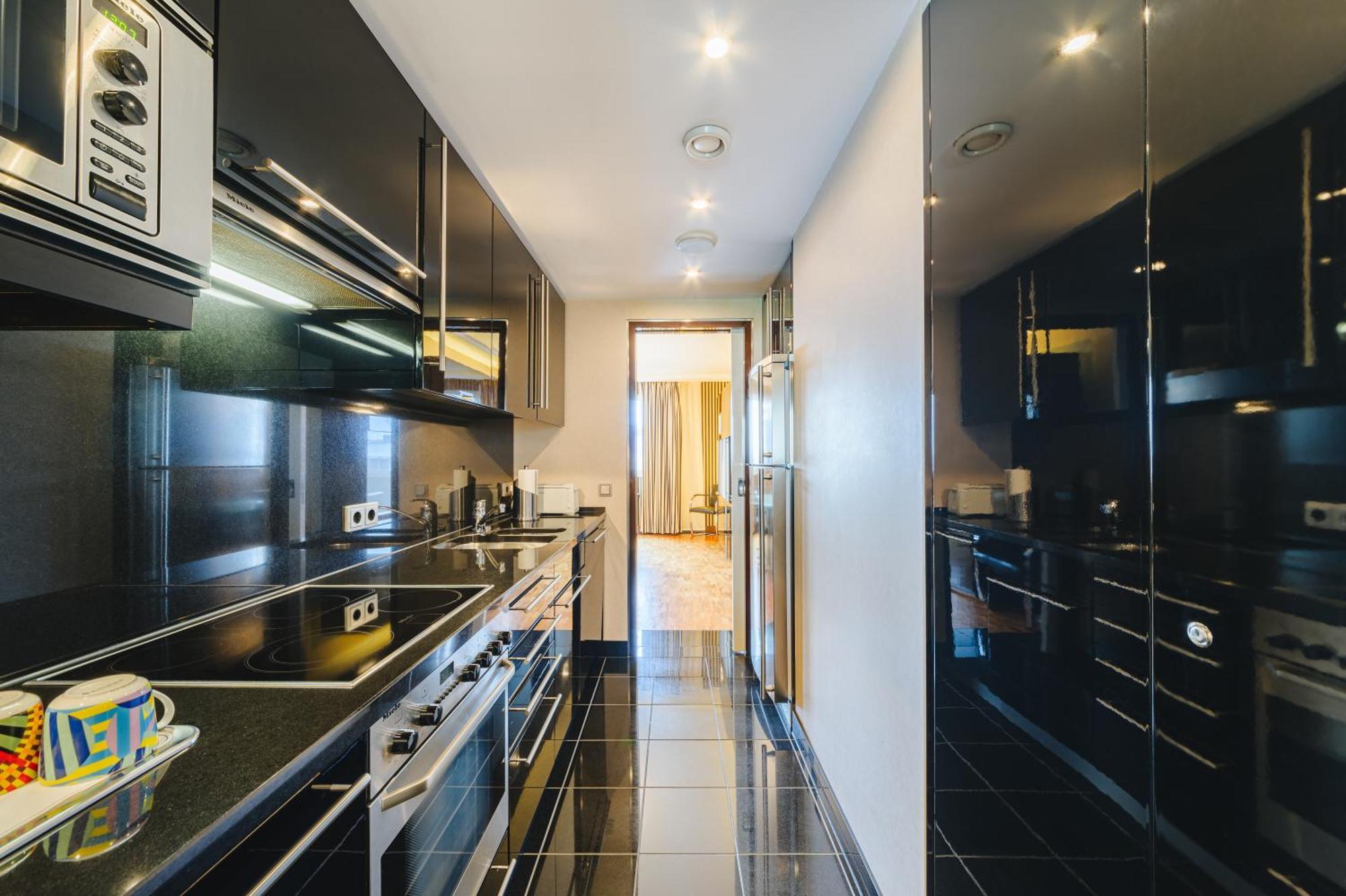 Hotel Pullman Berlin Schweizerhof Esterno foto A kitchen in a private house