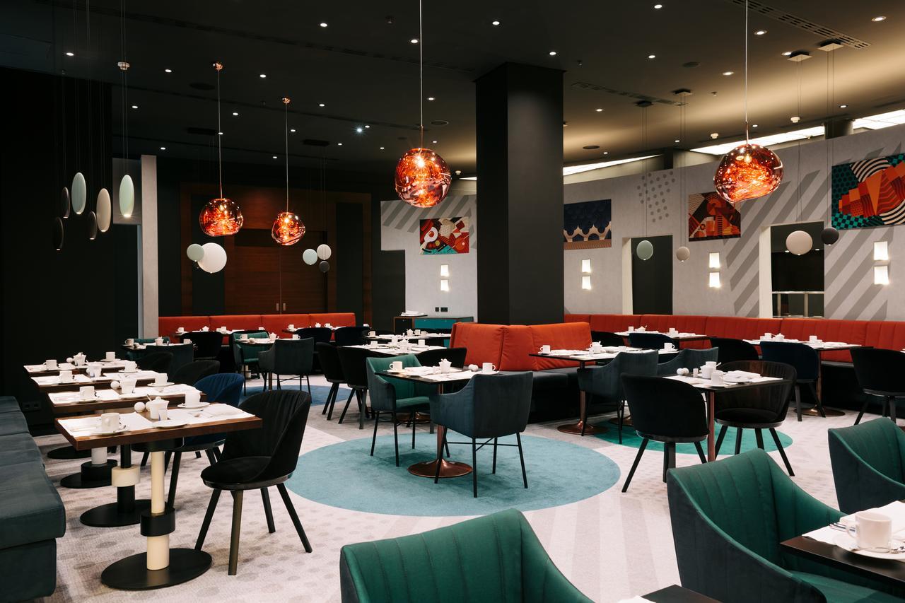 Hotel Pullman Berlin Schweizerhof Esterno foto Restaurant interior