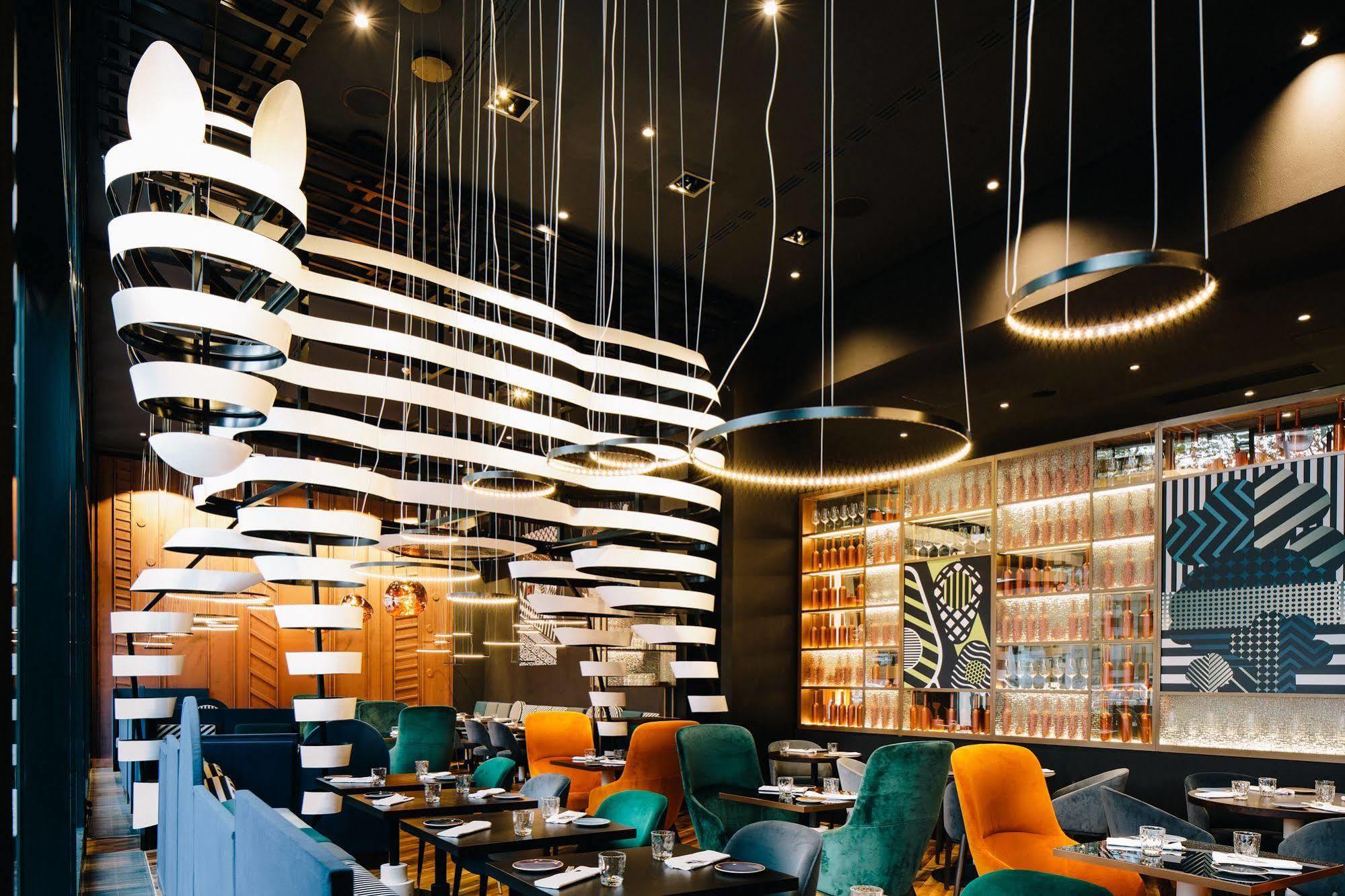 Hotel Pullman Berlin Schweizerhof Esterno foto Restaurant interior