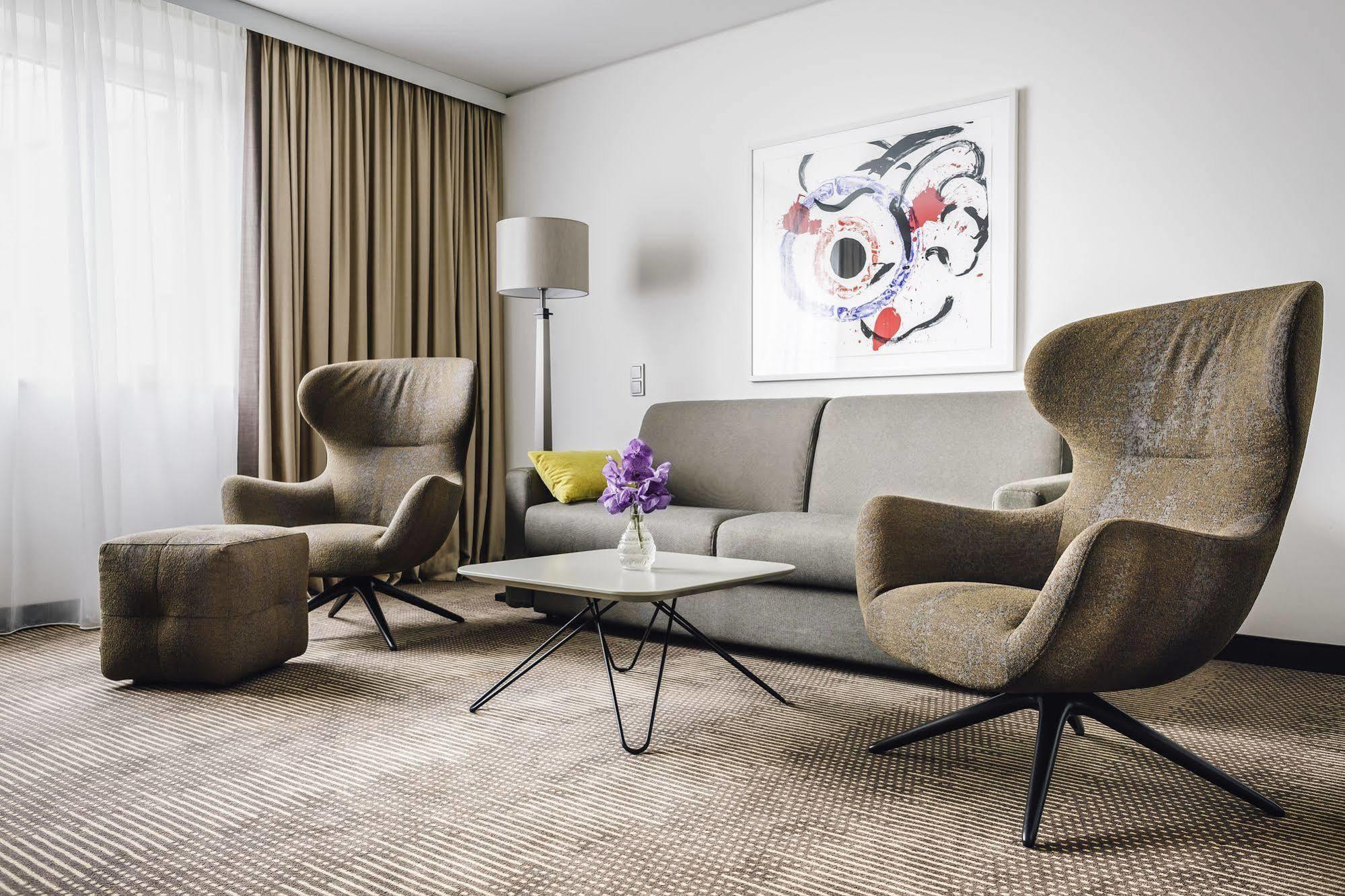 Hotel Pullman Berlin Schweizerhof Esterno foto Interior of a suite at the Hotel de la Paix